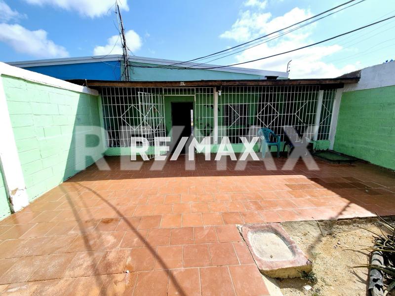 En Casa en Villa Marina Frente a la Playa